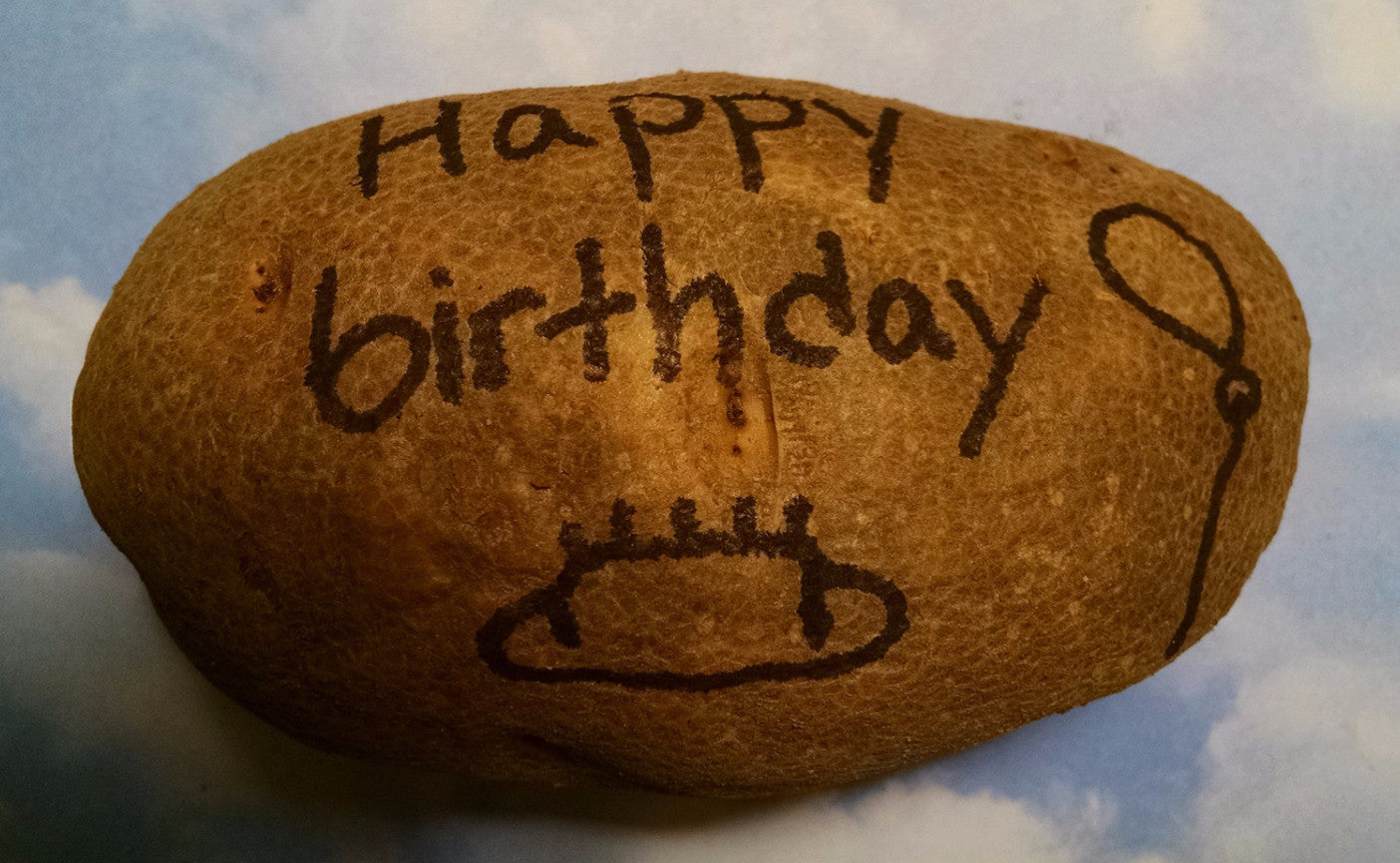 Happy Birthday, Ballon with a cake yum. Send a parcel potato with a happy birthday note! 